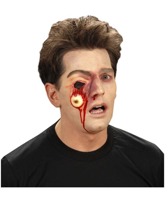 Prótesis de ojo colgando