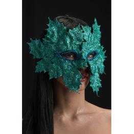 Máscara de plástico com folhas verdes aquáticas e glitter em uma bolsa
