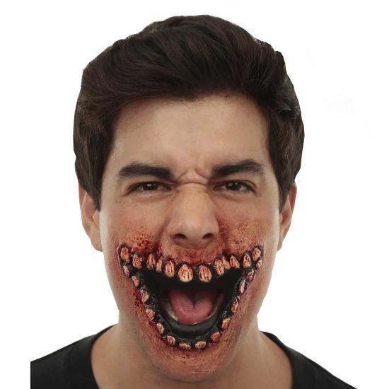 Aplicação de látex para dentadura sangrenta Aplicação de látex para dentadura sangrenta