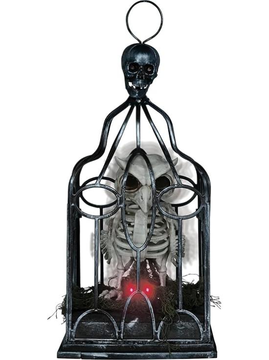 Esqueleto de coruja em gaiola com luz, som e movimento (33 cm)