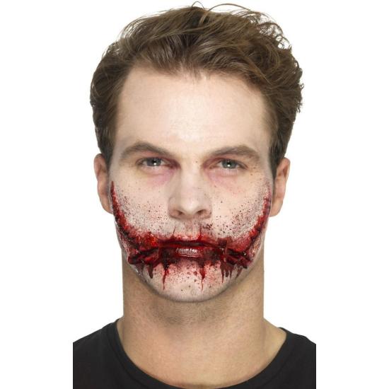 Prótese bucal de látex costurada