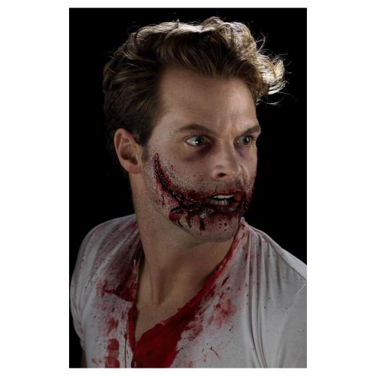 Prótese bucal de látex costurada